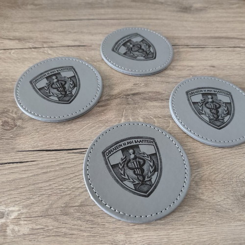 Coaster set 424 GSNE new, eco leather with emblem and motto