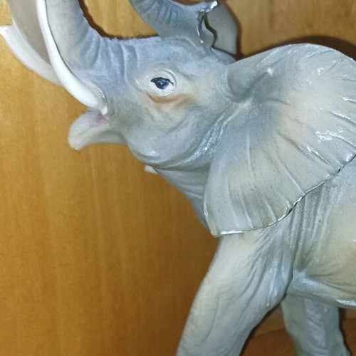 Decorative elephant statue used with wooden base vintage