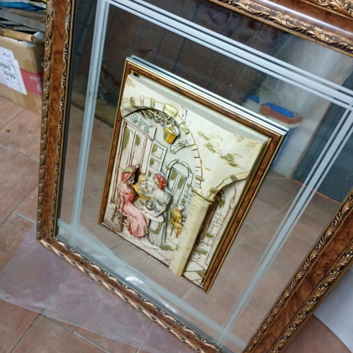 Mirror with plaster decorative scene like new, 50x70