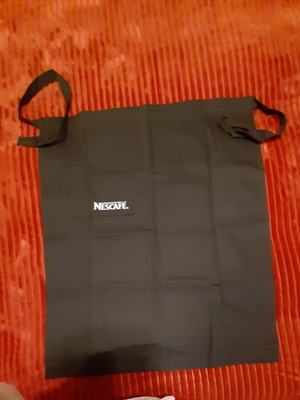 Collectible Batista Nescafe apron new, black