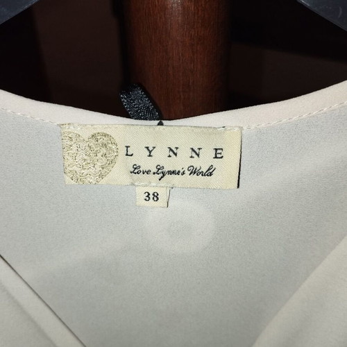 Lynne blouse like new, nude draped design with detachable chain