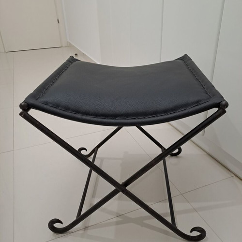 Leather footstool like new, black with cast iron frame