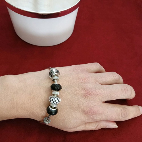 Steel bracelet with acrylic beads like new, black and silver