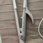 Izzy hair straightener and curler used