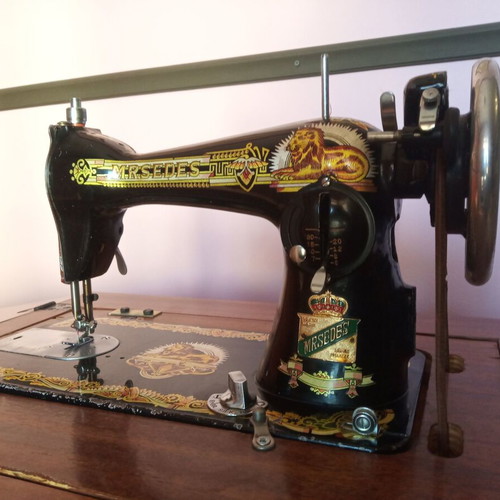 Mrsedes sewing machine used with antique furniture