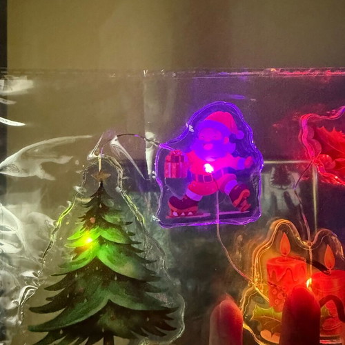Christmas LED string lights with transparent shapes set new
