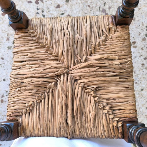 Vintage wicker stool used with wooden frame
