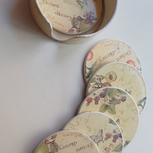 Trimar Orchard Nursery coaster set of 6 like new with storage base