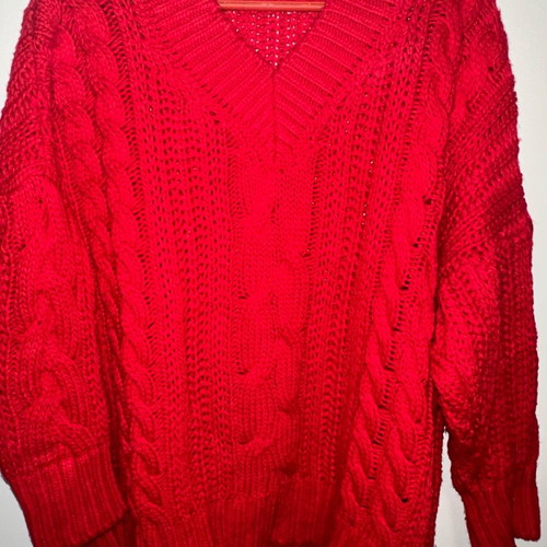 Knitted red one size sweater used