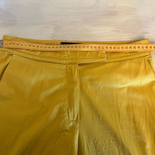 Yellow pants used, size Small, elastic fabric