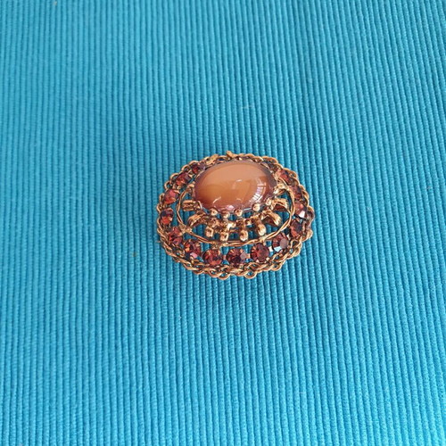 Vintage brooch used, gold color with crystals and cabochon