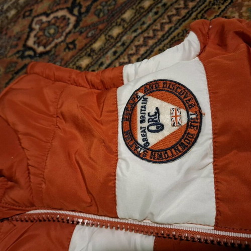 Orchestra sleeveless jacket new for boys 8 years old, orange and white