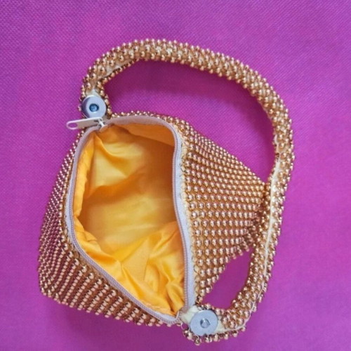 Mini pearl purse like new, gold, clip clasp and zipper