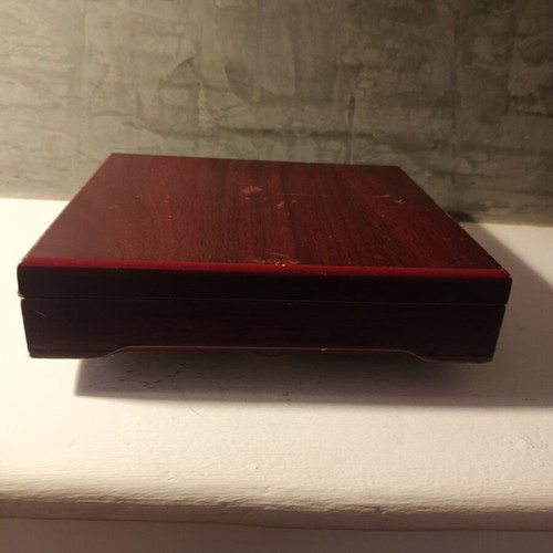 Bottle opening set in rosewood case