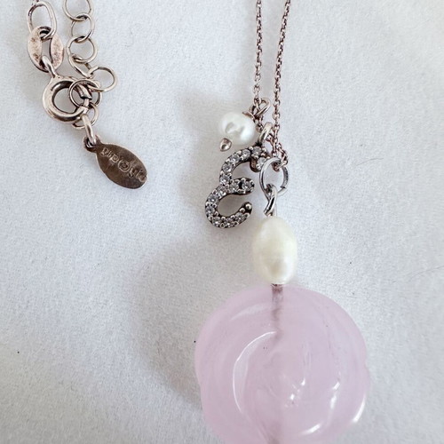 Gregio silver necklace used with rose quartz, pearls and zirconia charms