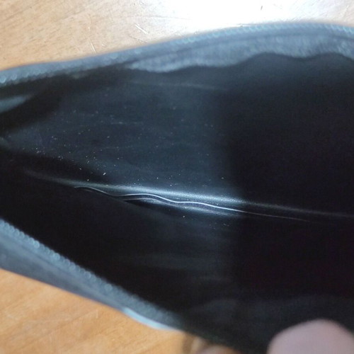 Velvet black handbag used with zipper and metal ring