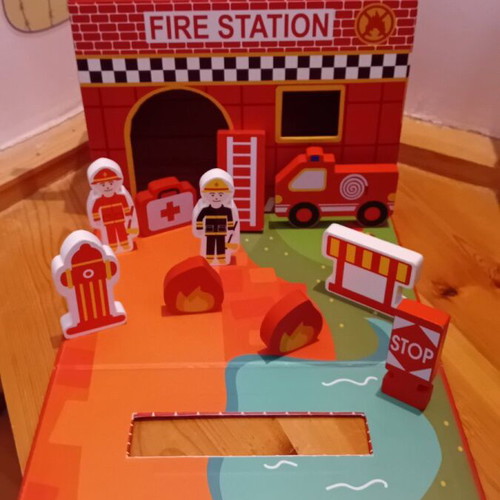 Small Foot fire station suitcase used with 11 wooden toys