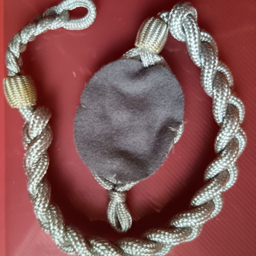 Collectible German uniform shoulder cord badge like new