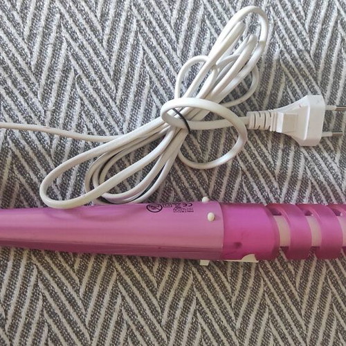 Portable hair curler like new