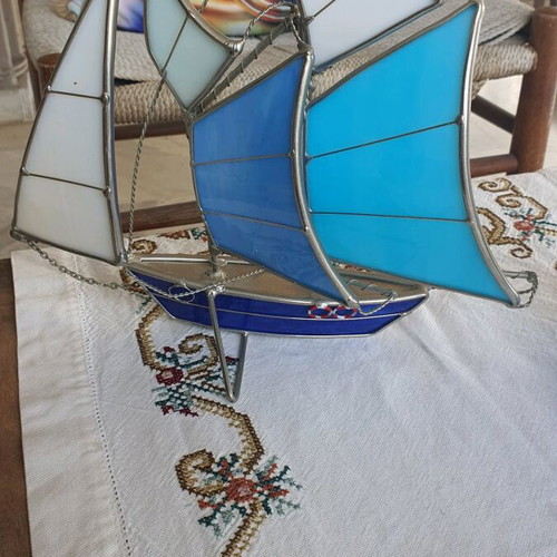 Set of sailboats like new made of steel and glass