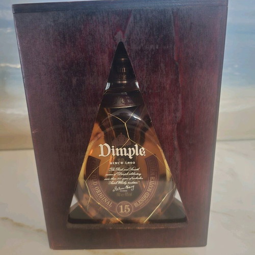 Dimple 15 years old in wooden packaging new