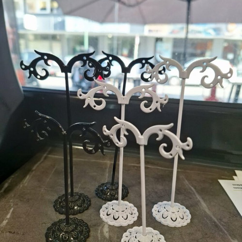 Earring stands, black and white