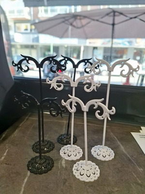 Earring stands, black and white