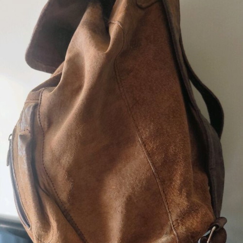Handmade leather backpack used with adjustable straps