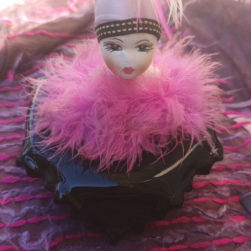 Clay jewelry box used with pink base and black top with Charleston doll feather