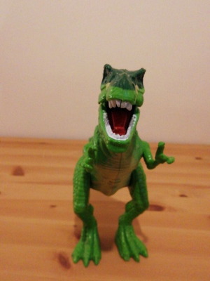 T-Rex dinosaur figure used, about 20 cm tall, tail slightly damaged