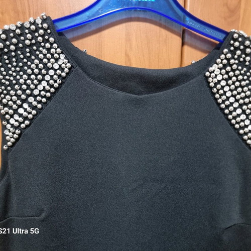 Women's black dress like new with studs on shoulders