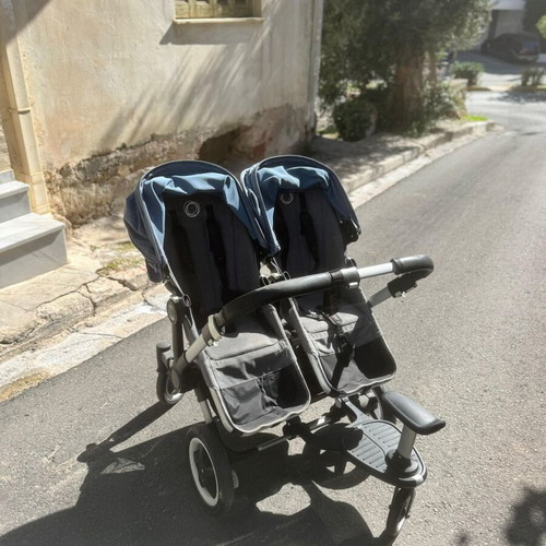 Bugaboo Donkey Twin stroller used with extension for third child