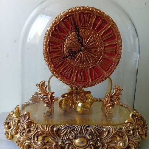 400-day mechanical clock with glass dome