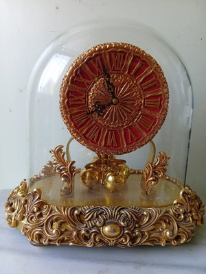 400-day mechanical clock with glass dome