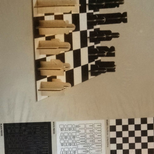 Chess game new, plastic laminated board for beginners