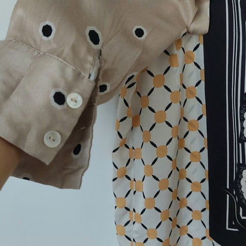 Silk women's shirt like new with geometric and leaf pattern