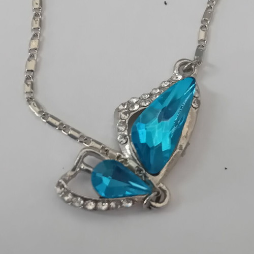 Silver color chain with blue pendant decor, new
