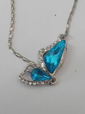Silver color chain with blue pendant decor, new