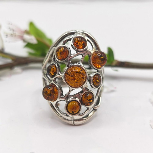 Silver ring with Baltic amber new, adjustable