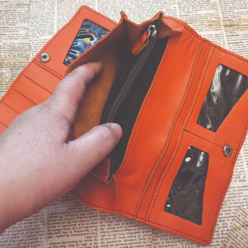 Leather wallet new, orange with black stitching