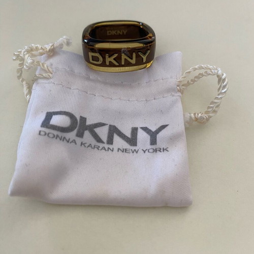 DKNY ring like new, plexiglass and steel, size 17, brown