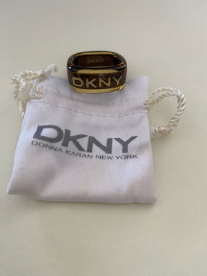 DKNY ring like new, plexiglass and steel, size 17, brown
