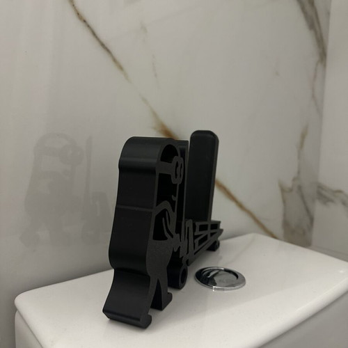 Original toilet paper holder with man pushing trolley design, black