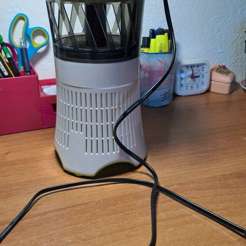 Electric insect trap used, works with power