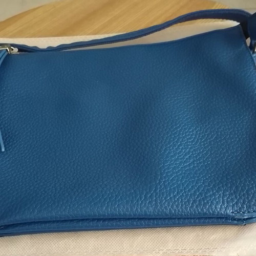 Crossbody bag new, blue leather with unique texture