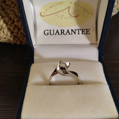 Solitaire ring white gold 18K new with 0.14ct brilliant diamond