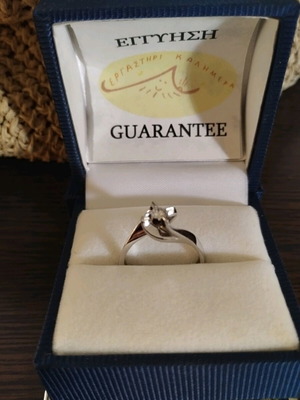 Solitaire ring white gold 18K new with 0.14ct brilliant diamond