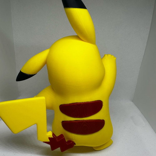 Pikachu figure like new in dynamic pose, height 19cm