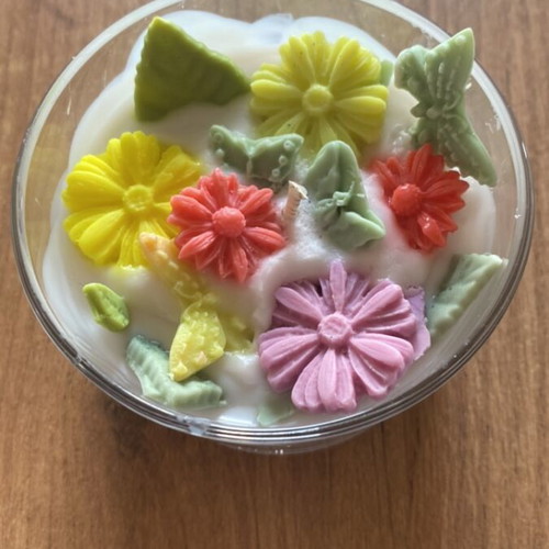 Soy wax scented candle in jar with vanilla aroma