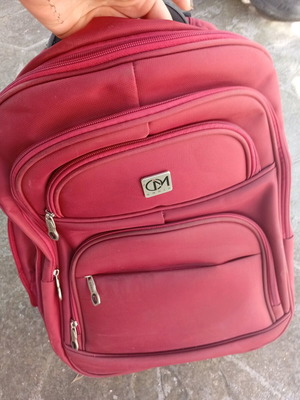 Rolling backpack 6 compartments like new, red